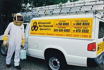 Arizona City bee removal service truck and employee